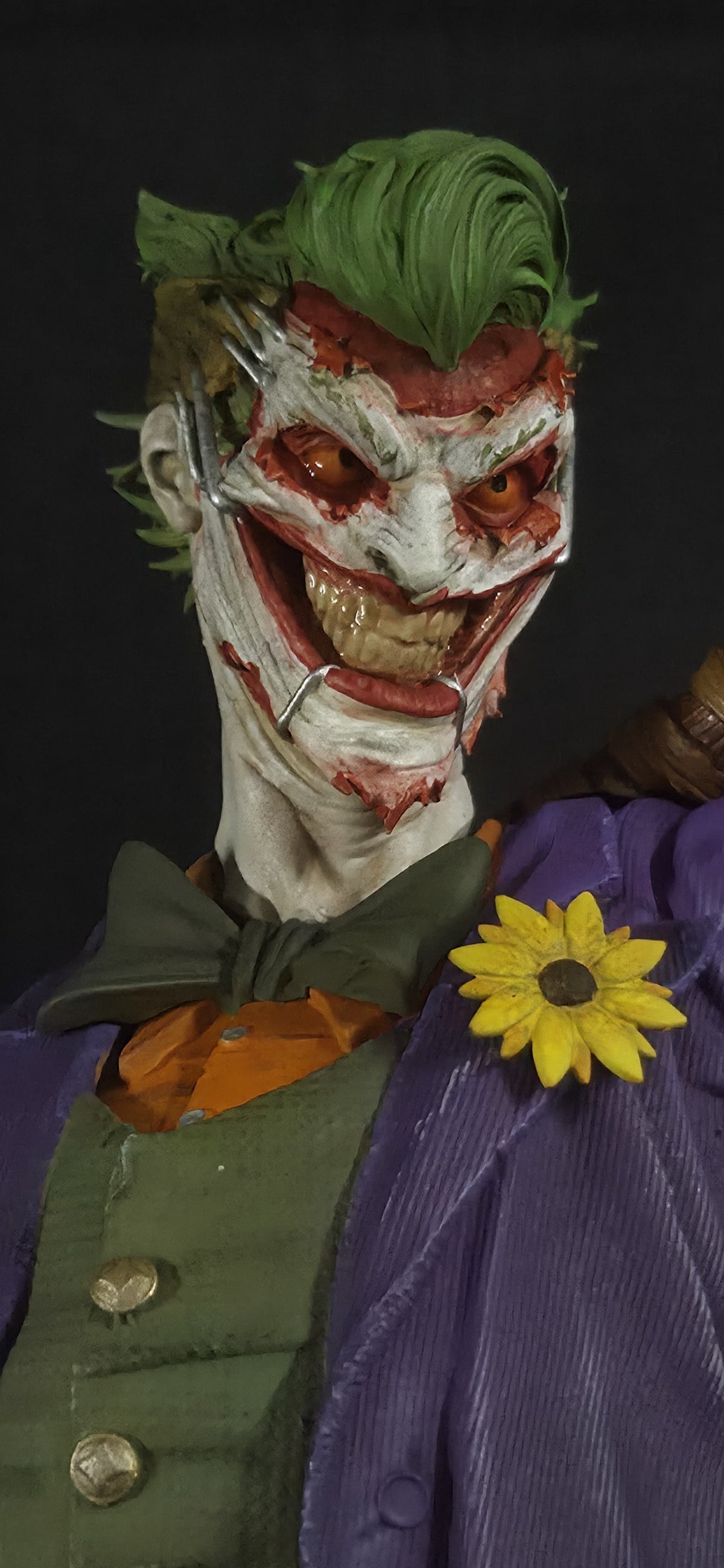The Joker statue face and upper-body details