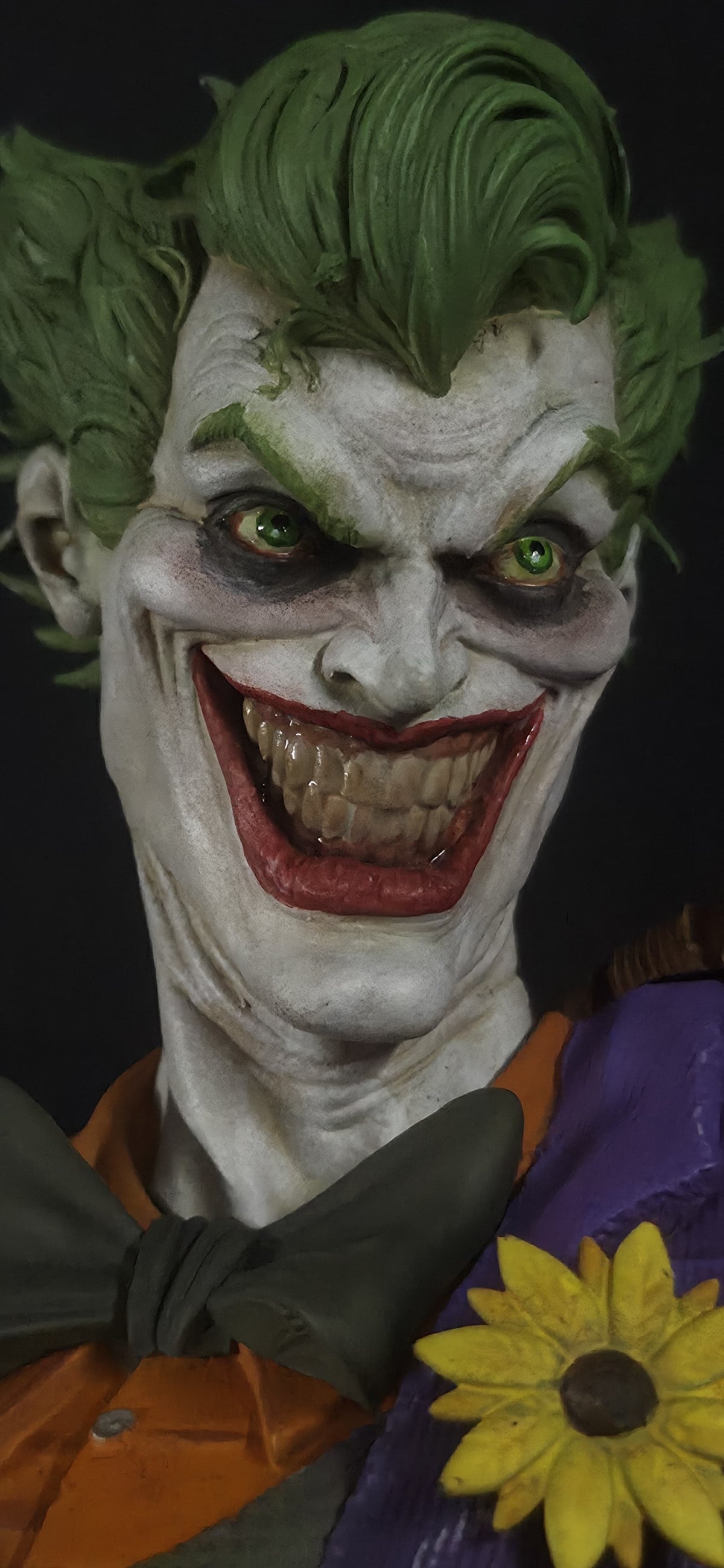 Close-up portrait of the Joker collectible statue