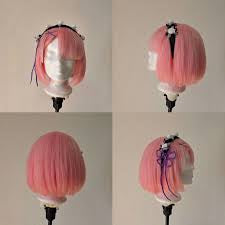 Pink Ram-inspired cosplay wig with decorative hair accessories