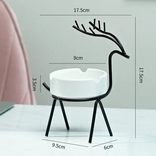 White ceramic ashtray with black reindeer metal stand and dimensions