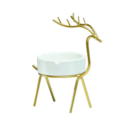 White ceramic ashtray with gold reindeer metal stand