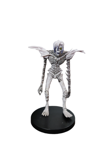Rem figure isolated on black base