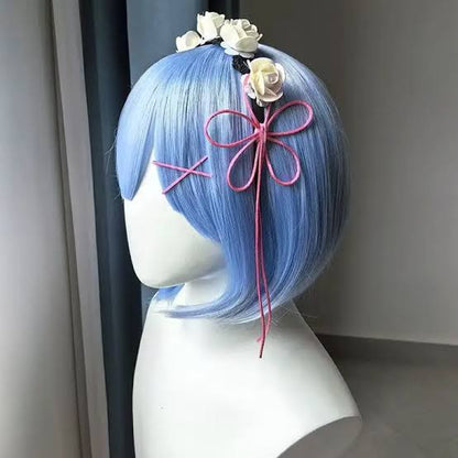 Rem from Re:Zero inspired blue bob cosplay wig with pink hair accessories and white floral headband