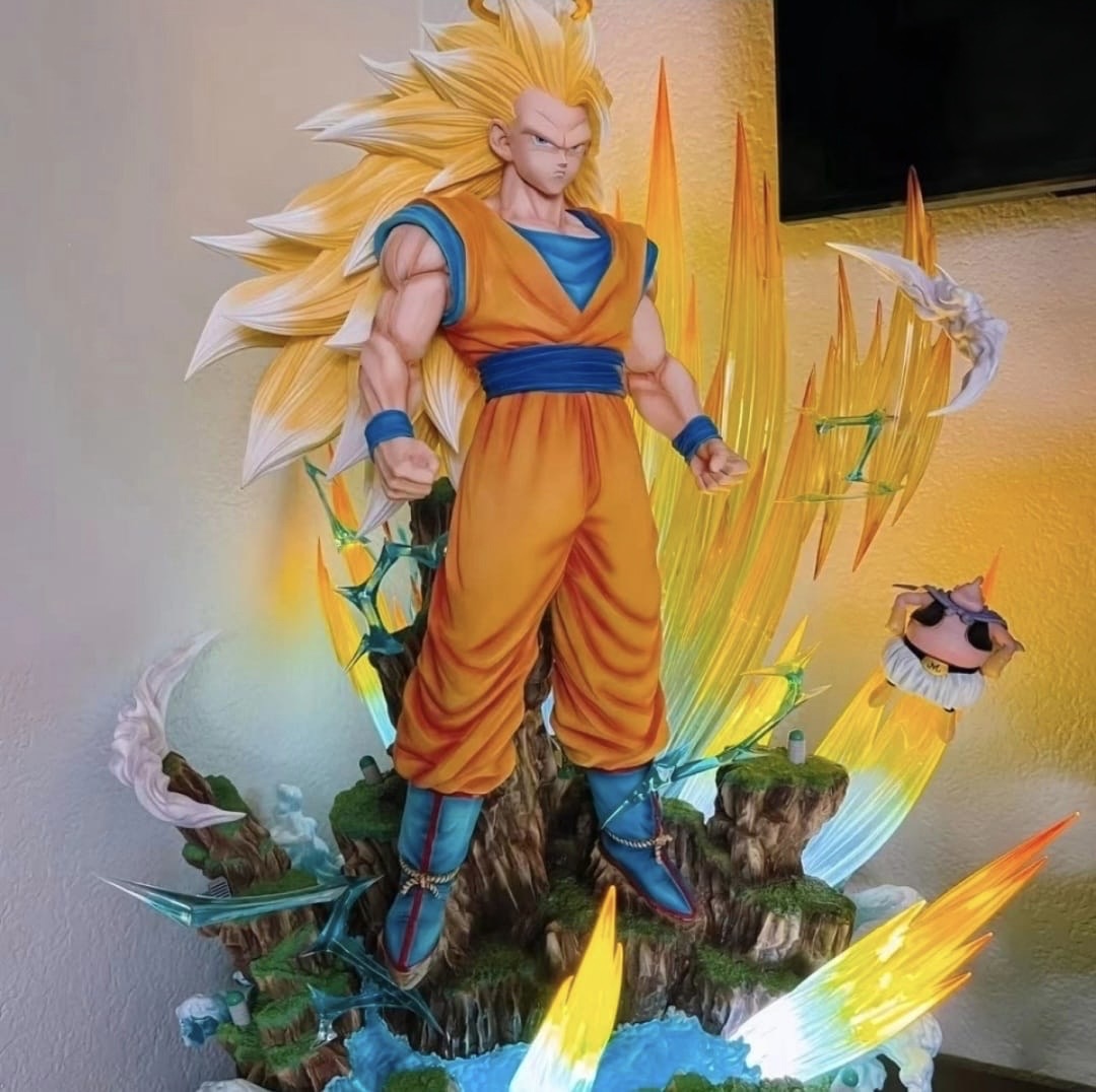Super Saiyan 3 Goku statue with energy-effect base